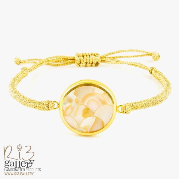 دستبند صدف طلایی با طرح پولکی