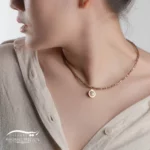 گردنبند طلا زنانه تافی ( ساخته شده از کریستال، مروارید، طلا)