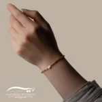 دستبند طلا زنانه نوریا (ساخته شده از کریستال، منجوق، طلا)