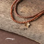 گردنبند طلا زنانه افرا ( ساخته شده از طلا، دلربا و منجوق )